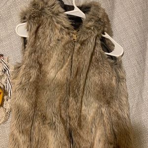 Fur vest.
